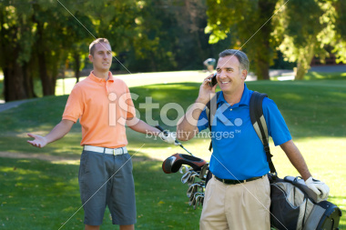 stock-photo-14339584-on-the-phone-while-golfing