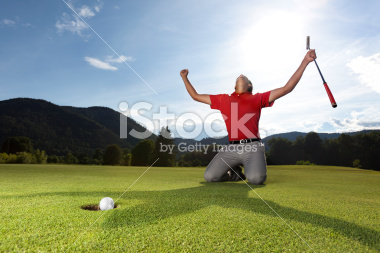 stock-photo-19017330-happy-golf-player-on-green