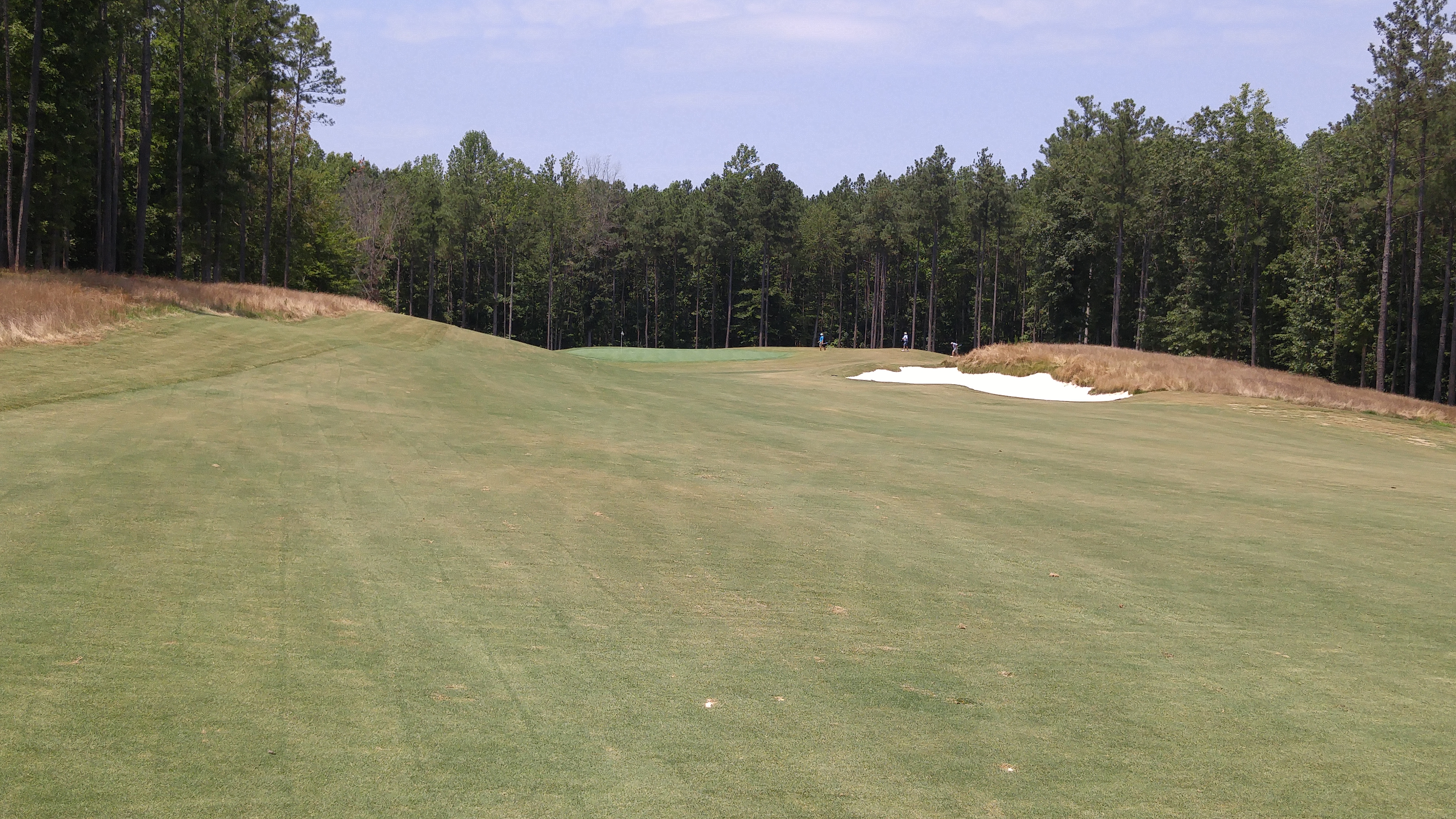 The approach to the par-4 fourth, ideally from the left, invites a swinging draw.
