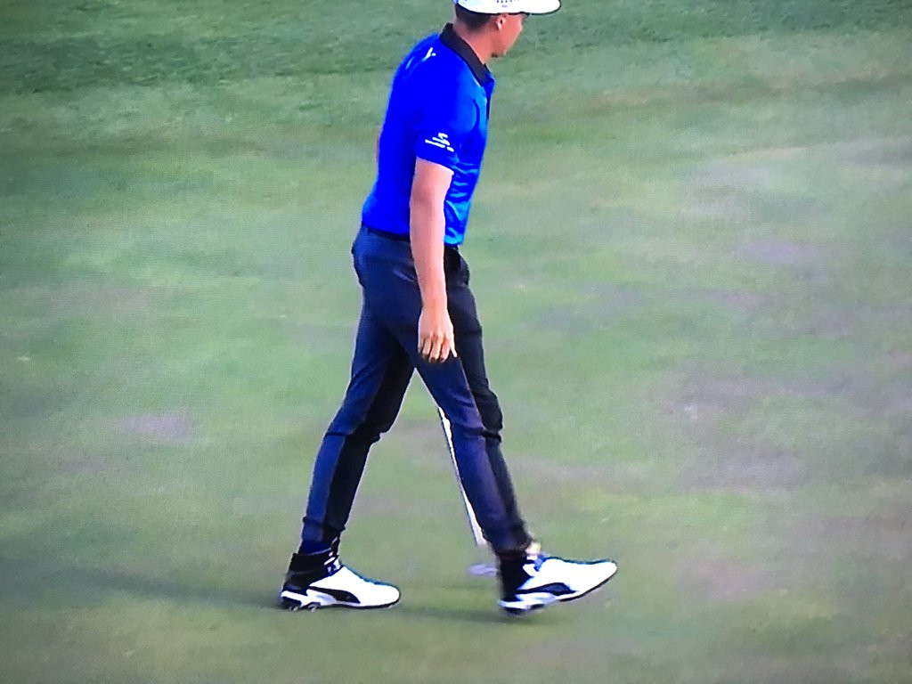 wore some two-tone Puma Golf pants 