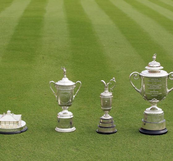 The four men's major championship trophies
