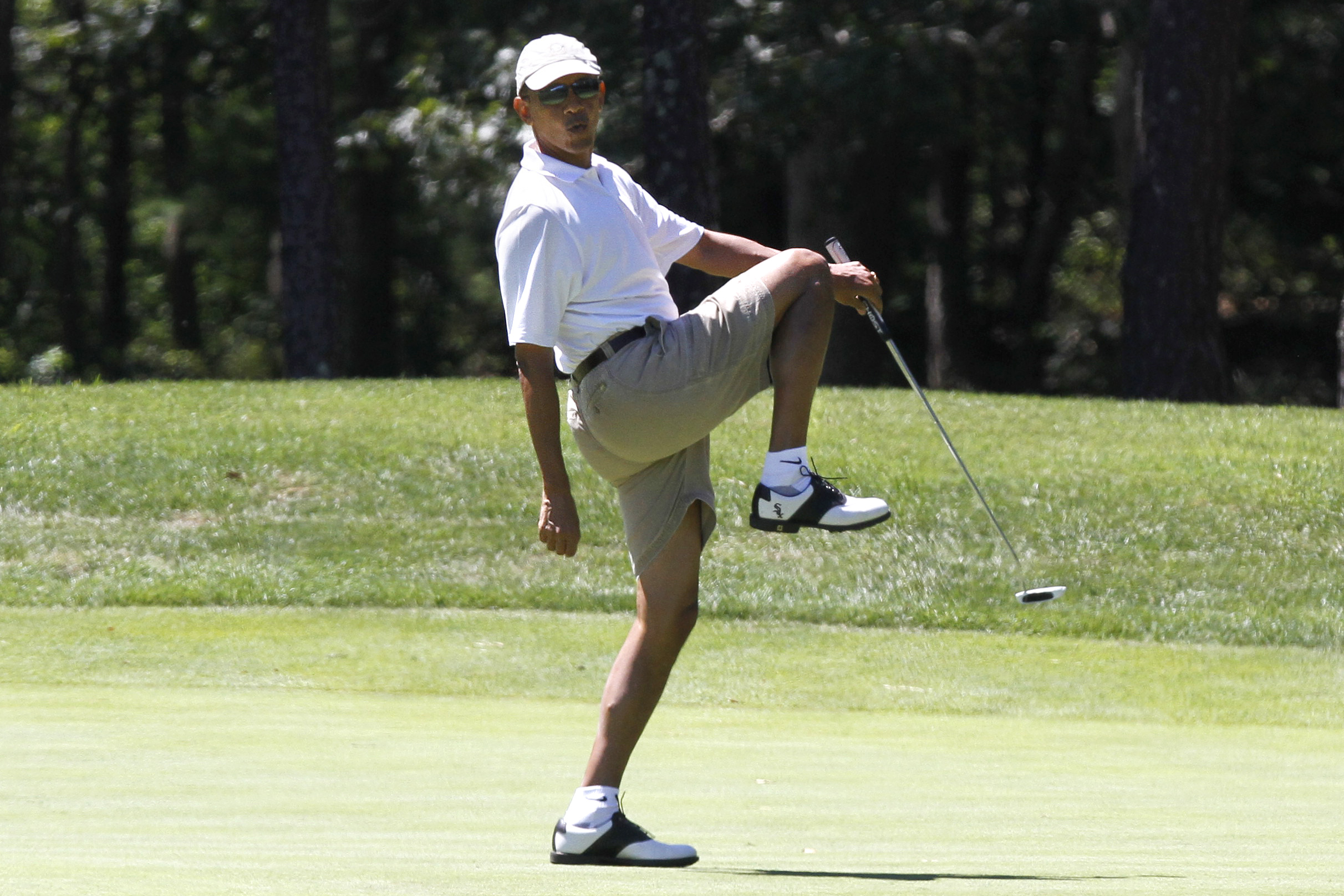 Image result for obama plays golf