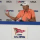 What does it mean to be the clubhouse leader in a golf tournament?