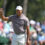 What is the logo on Tiger Woods’ hat, sweater and shirt at the 2024 Masters?