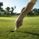 Here’s how to properly repair a ball mark on a putting green on a golf course